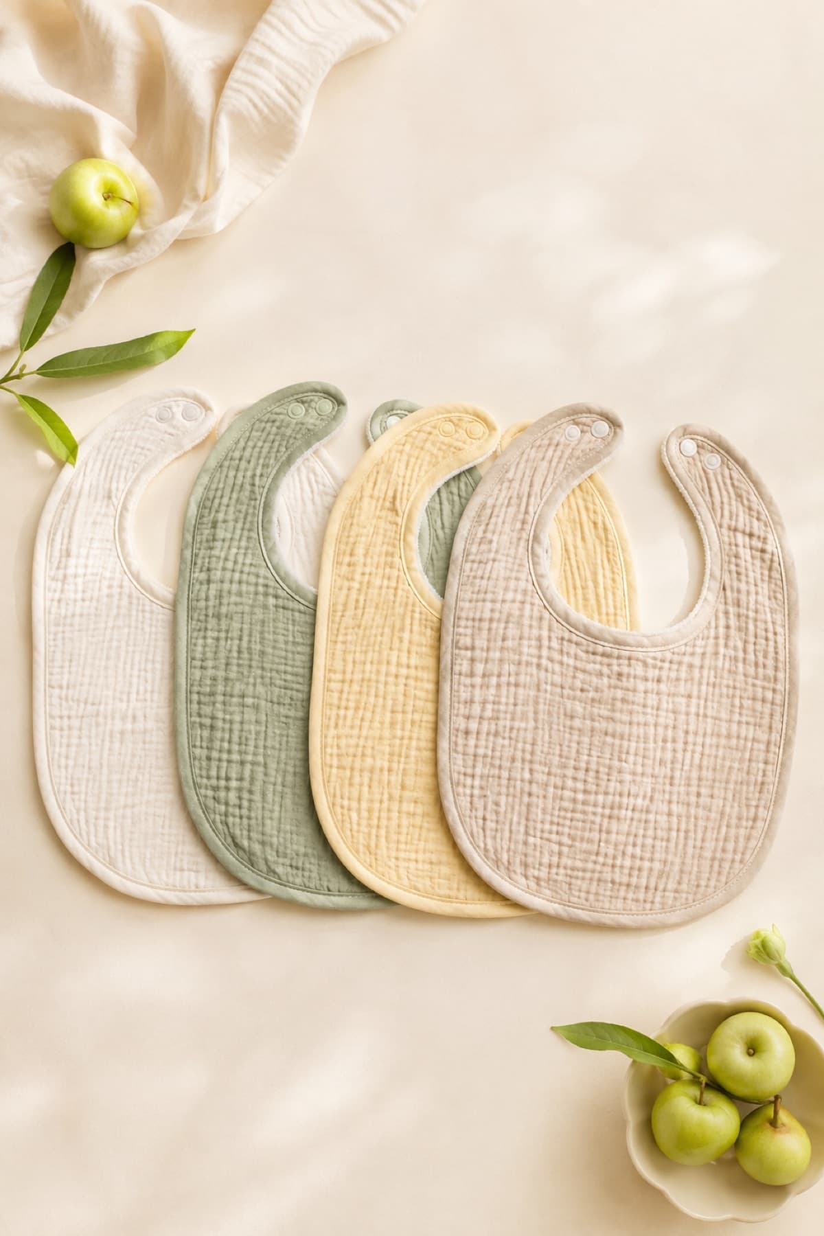 Bib Set of 4 laid flat